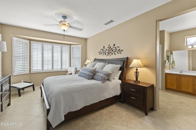 bedroom featuring visible vents and light tile patterned floors