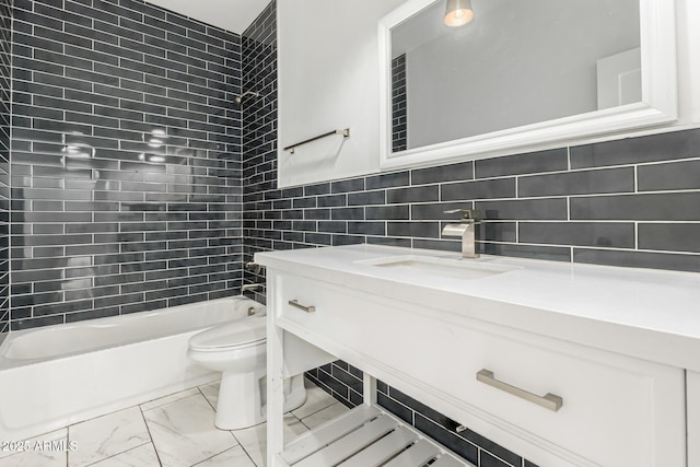 3614 W Granada Rd, Phoenix, AZ 85009 - bathroom featuring vanity, marble look tiles, tile walls, and bathtub / shower combination