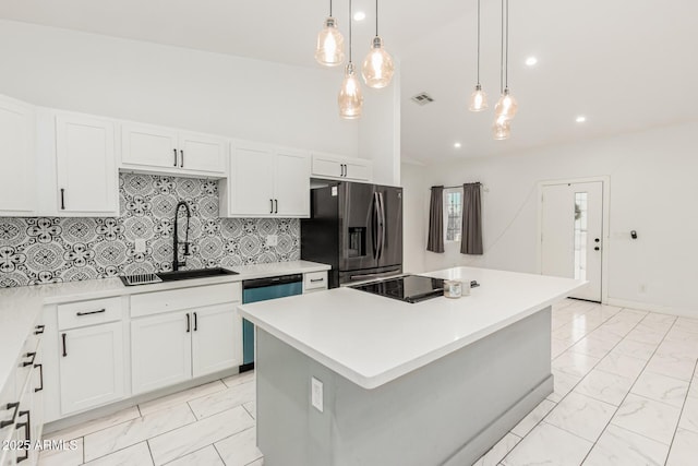 3614 W Granada Rd, Phoenix, AZ 85009 - kitchen with stainless steel fridge, dishwashing machine, light marble finish flooring, light countertops, and recessed lighting