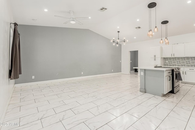3614 W Granada Rd, Phoenix, AZ 85009 - kitchen featuring stainless steel range, a ceiling fan, lofted ceiling, light countertops, and a chandelier