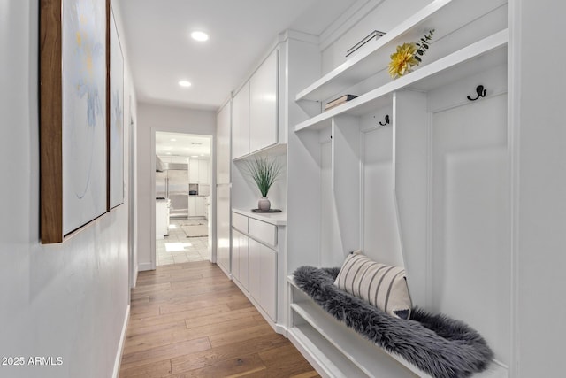 mudroom featuring light wood-type flooring