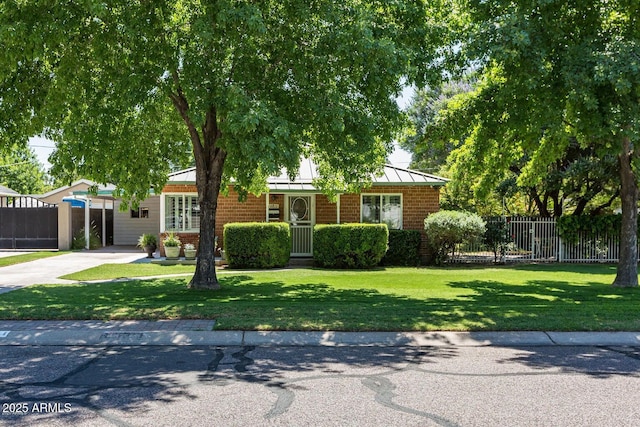 view of front of home with a front yard