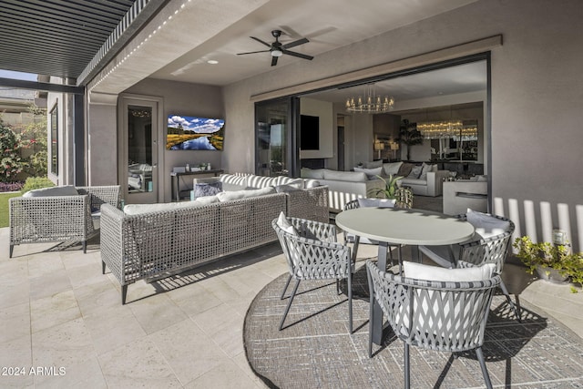 view of patio featuring ceiling fan and an outdoor hangout area