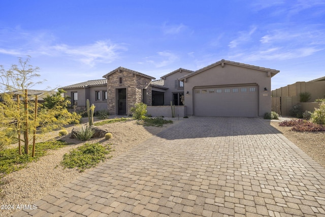 view of front of property featuring a garage