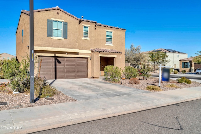 view of front of home featuring a garage