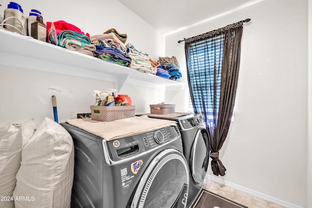 laundry area featuring washer and clothes dryer