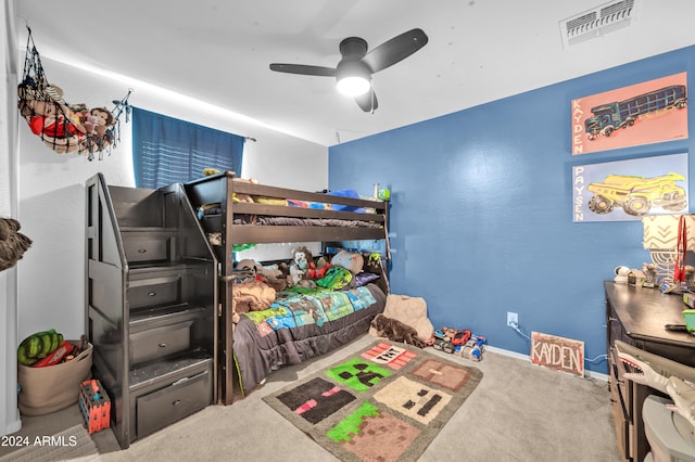 bedroom with ceiling fan and carpet floors