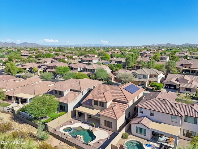 bird's eye view with a mountain view