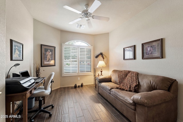 office featuring ceiling fan and dark hardwood / wood-style flooring