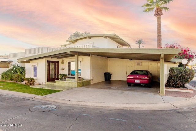 view of front of house with a carport