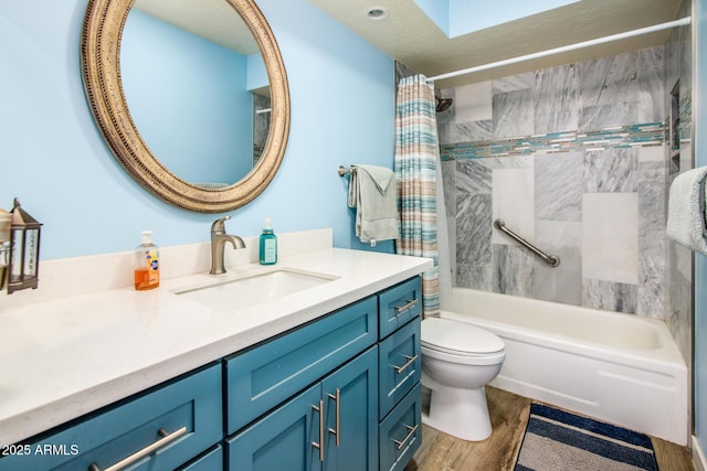 full bathroom with shower / bathtub combination with curtain, toilet, wood finished floors, and vanity