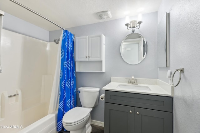 full bathroom featuring vanity, toilet, shower / bathtub combination with curtain, and a textured ceiling