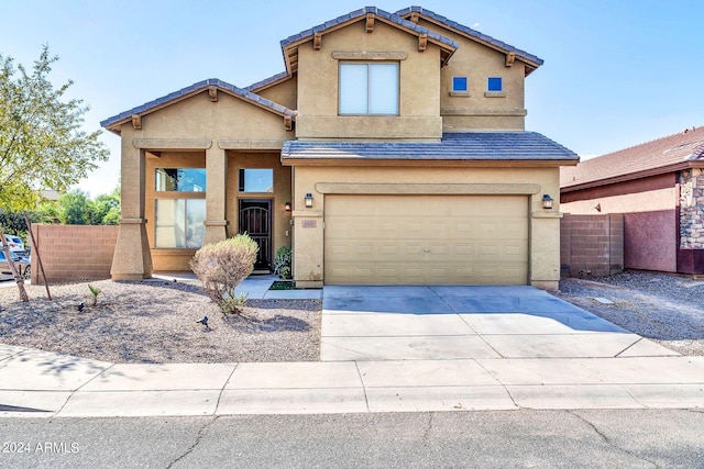 view of property featuring a garage