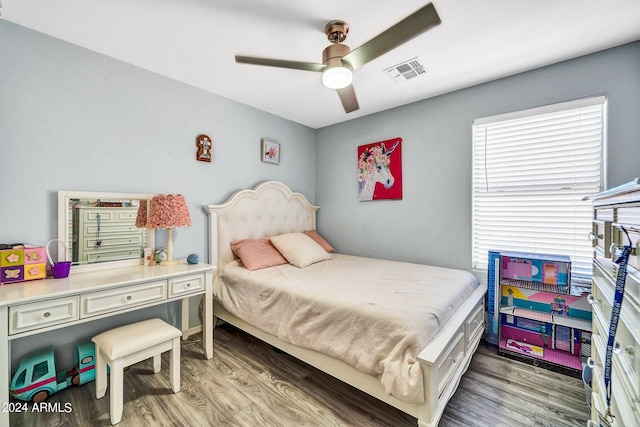 bedroom featuring wood-type flooring and ceiling fan