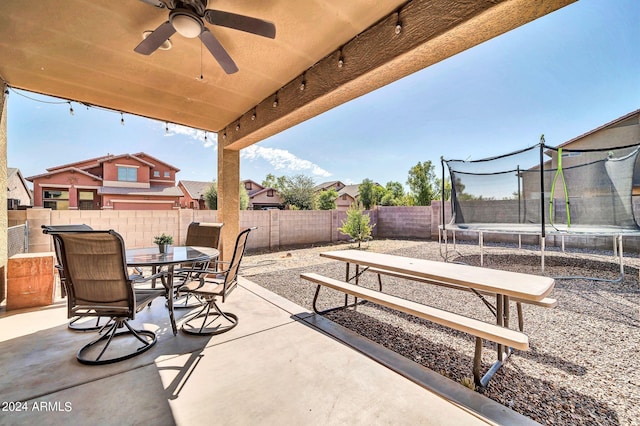 view of patio / terrace featuring a trampoline and ceiling fan