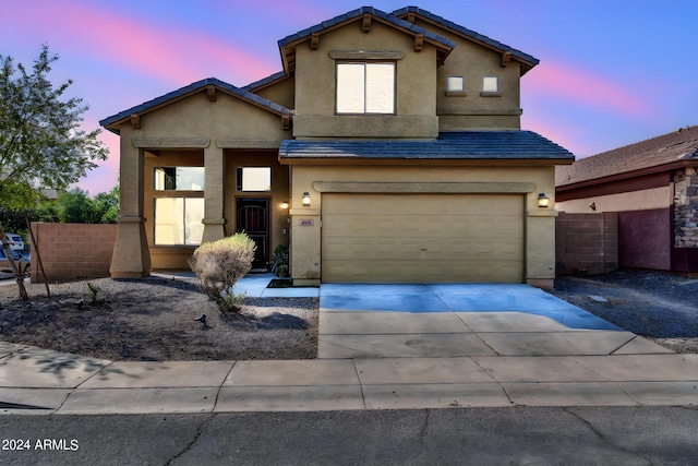 view of front property with a garage