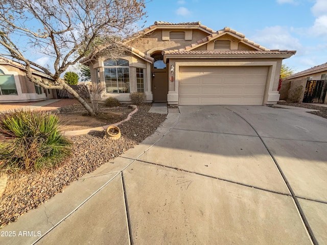 view of front of property with a garage