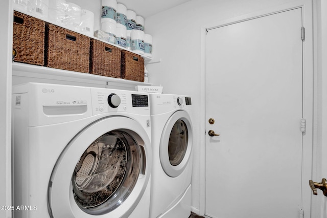 laundry room featuring laundry area and washing machine and clothes dryer