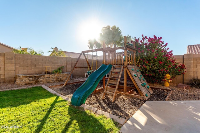 view of play area featuring a yard