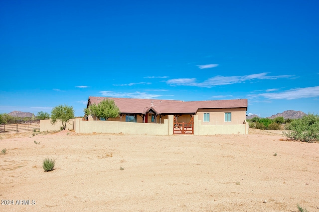 view of front of home with a mountain view