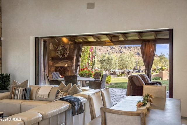 view of patio featuring an outdoor living space and a mountain view