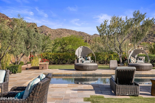 view of patio with a mountain view