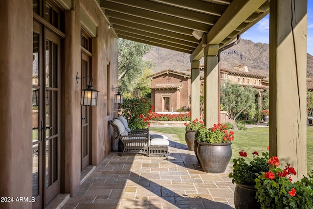 view of patio with a mountain view