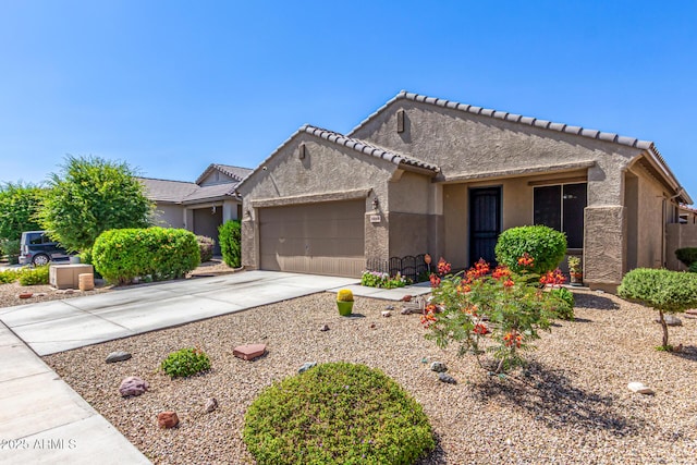 18008 W Tina Ln, Surprise, AZ 85387 - ranch-style home with a garage, stucco siding, concrete driveway, and a tiled roof