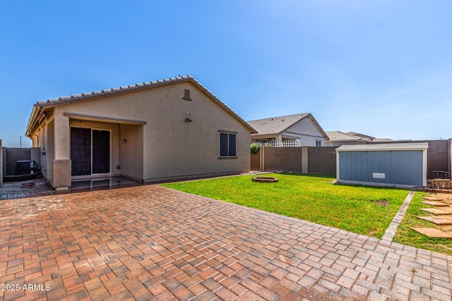 18008 W Tina Ln, Surprise, AZ 85387 - back of property featuring a patio and stucco siding