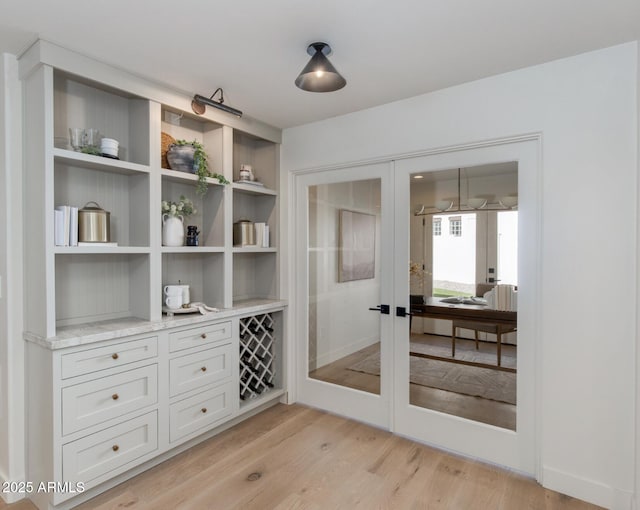3186 E Stella Ln, Phoenix, AZ 85016 - interior space featuring french doors and light wood finished floors