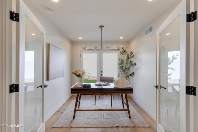 3186 E Stella Ln, Phoenix, AZ 85016 - office area featuring french doors, light wood finished floors, baseboards, and recessed lighting