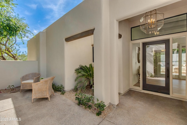 3186 E Stella Ln, Phoenix, AZ 85016 - doorway to property with a patio and stucco siding