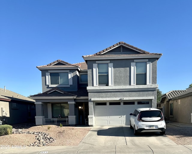491 E Jeanne Ln, San Tan Valley, AZ 85140 - view of front of home featuring driveway, stucco siding, a tile roof, and an attached garage