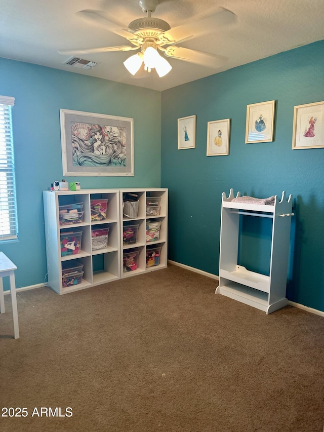 491 E Jeanne Ln, San Tan Valley, AZ 85140 - recreation room featuring ceiling fan, carpet floors, and baseboards