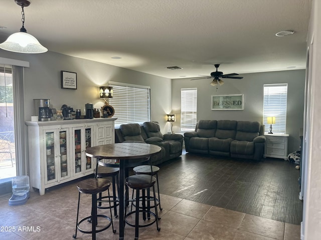 491 E Jeanne Ln, San Tan Valley, AZ 85140 - dining area featuring a ceiling fan, plenty of natural light, and tile patterned floors