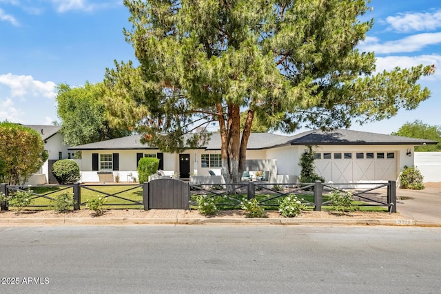 3308 N 51st St, Phoenix, AZ 85018 - ranch-style house featuring a garage and concrete driveway