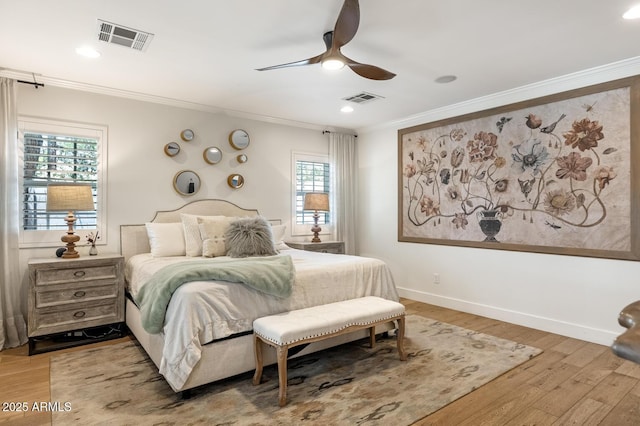 3308 N 51st St, Phoenix, AZ 85018 - bedroom with ornamental molding, light wood-style flooring, baseboards, ceiling fan, and recessed lighting