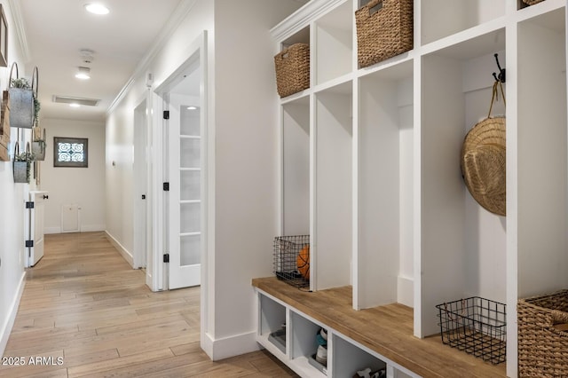 3308 N 51st St, Phoenix, AZ 85018 - mudroom with light wood-type flooring, crown molding, baseboards, and recessed lighting