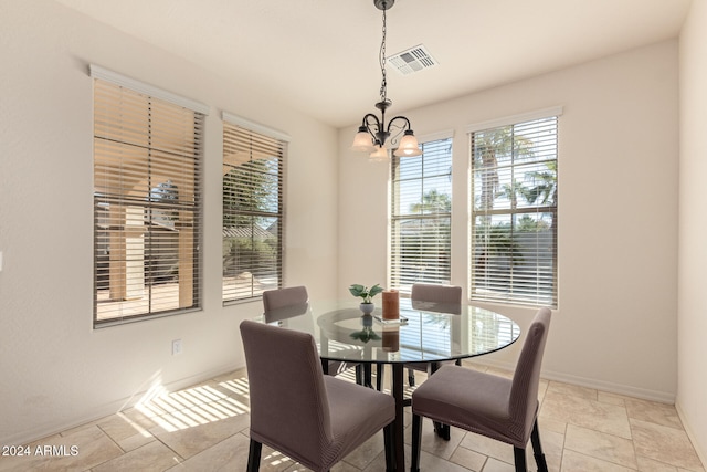 dining area with a chandelier