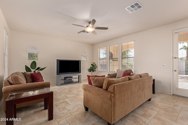 living room featuring ceiling fan