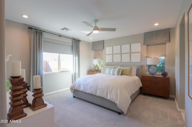 carpeted bedroom featuring ceiling fan