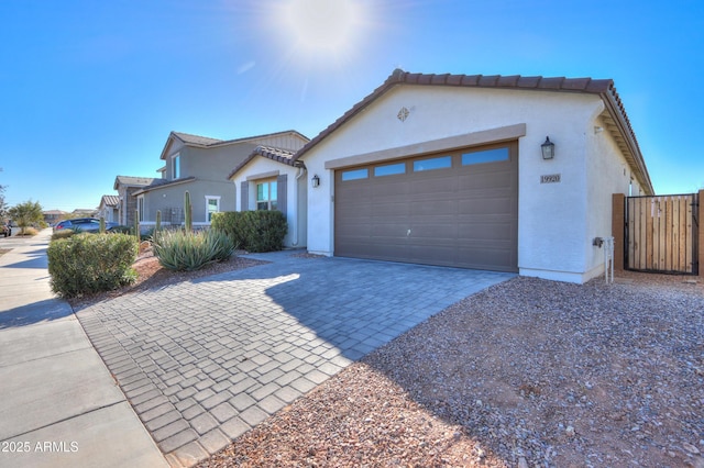 view of front of home with a garage