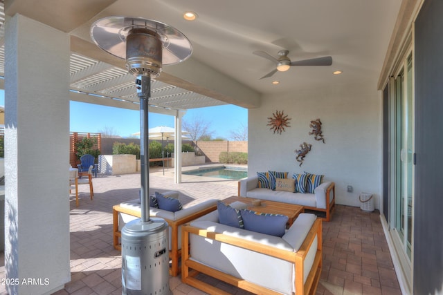 view of patio featuring a fenced in pool, a pergola, an outdoor hangout area, and ceiling fan