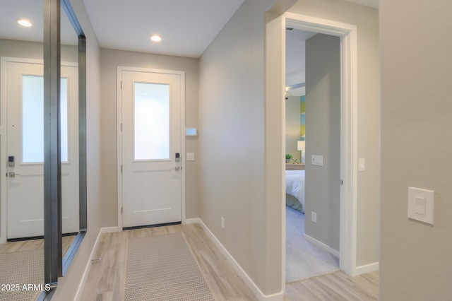 doorway featuring light wood-type flooring