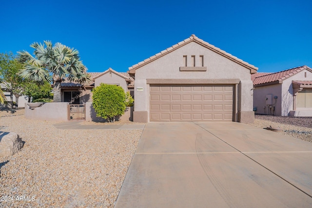 view of front of home with a garage