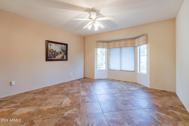 spare room featuring ceiling fan