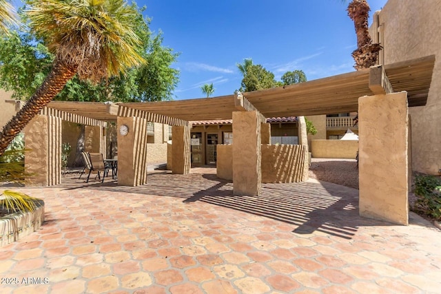 view of patio / terrace featuring a pergola