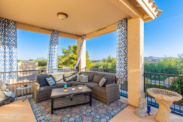 view of patio / terrace featuring an outdoor living space and a balcony