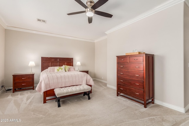 carpeted bedroom with ceiling fan and ornamental molding