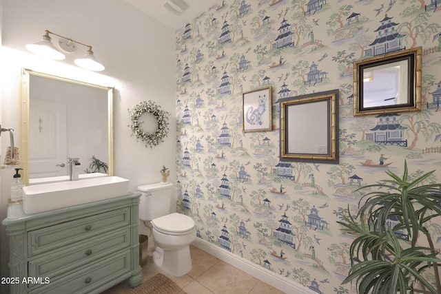 bathroom with tile patterned floors, visible vents, toilet, baseboards, and vanity